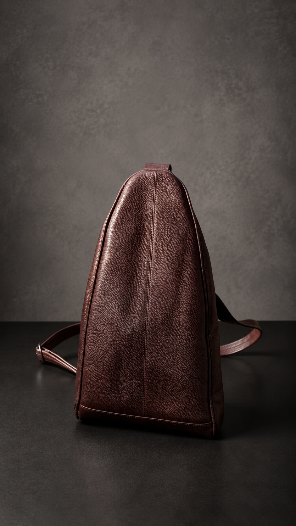 Teardrop Satchel standing on the floor — front view